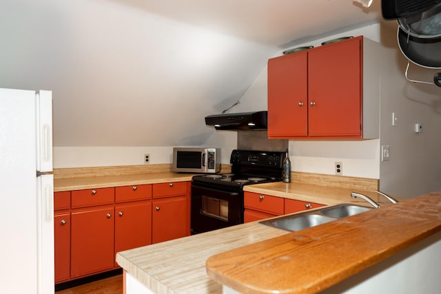 546 Main St, Westbrook, ME 04092 - kitchen featuring black electric range, stainless steel microwave, extractor fan, freestanding refrigerator, and red cabinetry