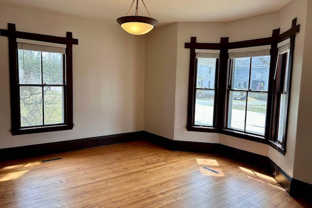 6 Naskeag Rd, Brooklin, ME 04616 - empty room with light wood-style flooring, baseboards, a healthy amount of sunlight, and visible vents