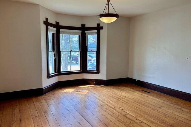 6 Naskeag Rd, Brooklin, ME 04616 - empty room featuring wood-type flooring, baseboards, and visible vents