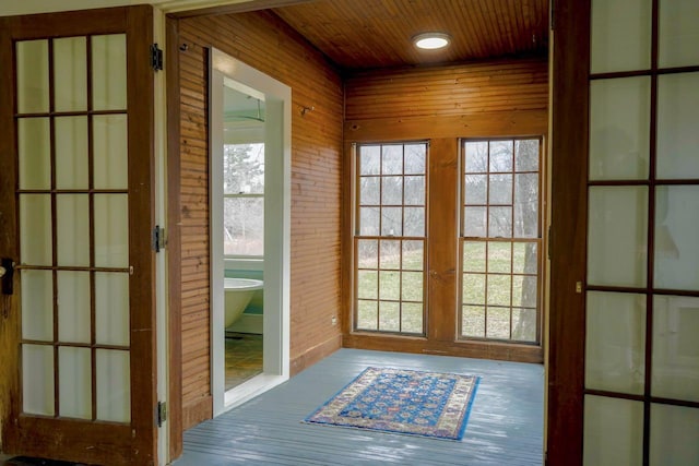 6 Naskeag Rd, Brooklin, ME 04616 - entryway with wooden walls, french doors, wood ceiling, and wood finished floors