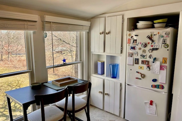 6 Naskeag Rd, Brooklin, ME 04616 - kitchen with vaulted ceiling and freestanding refrigerator