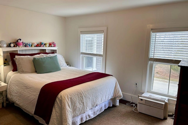 6 Naskeag Rd, Brooklin, ME 04616 - bedroom featuring a wall mounted air conditioner, carpet floors, and multiple windows