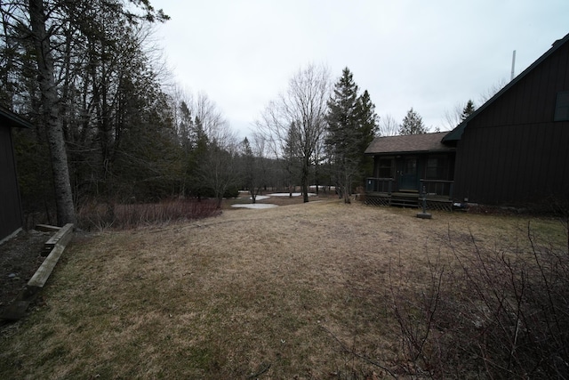 view of yard featuring a deck