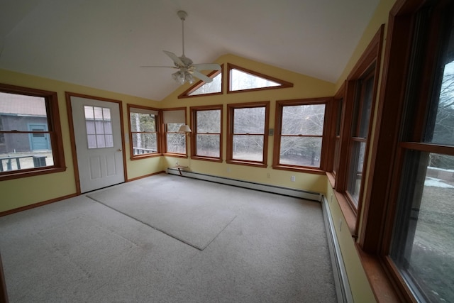 unfurnished sunroom with a wealth of natural light and a baseboard radiator