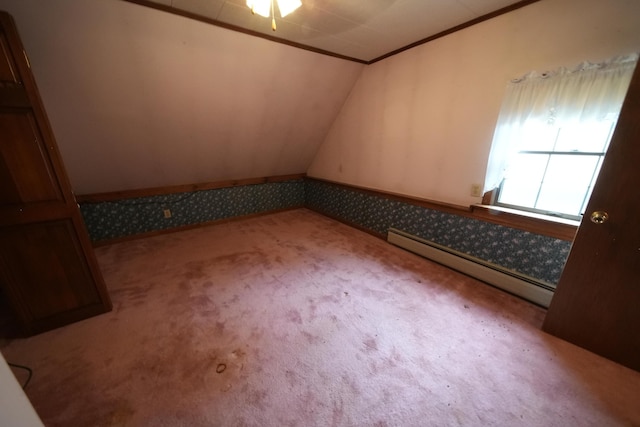 bonus room with wallpapered walls, lofted ceiling, a wainscoted wall, carpet flooring, and baseboard heating
