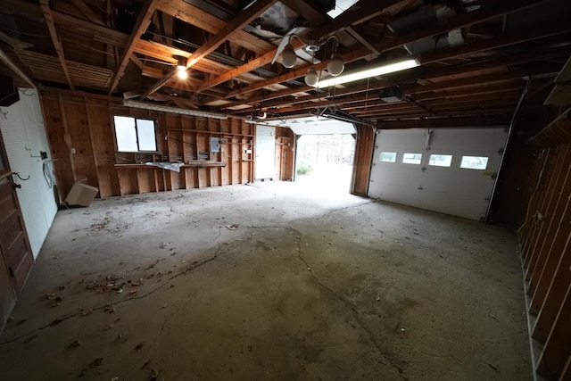 miscellaneous room featuring a healthy amount of sunlight and a garage