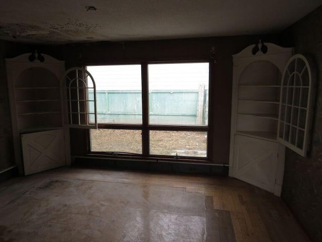 empty room featuring wood finished floors