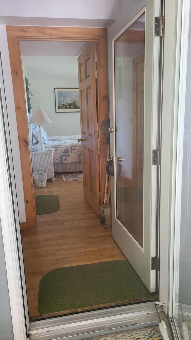 hall featuring wood finished floors