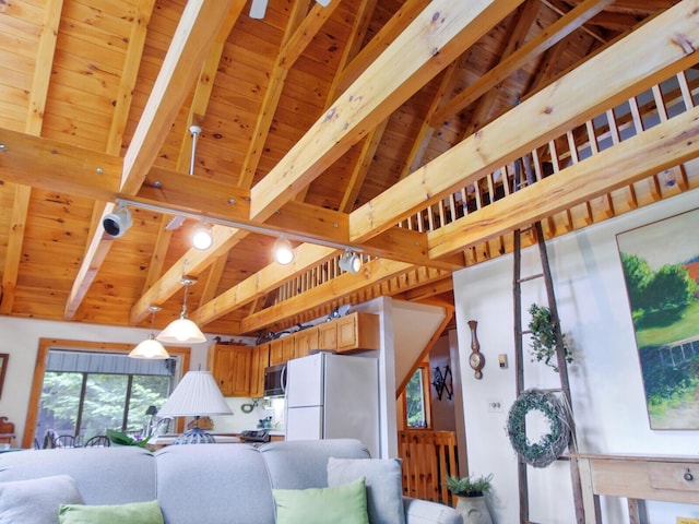living room with beam ceiling and wooden ceiling