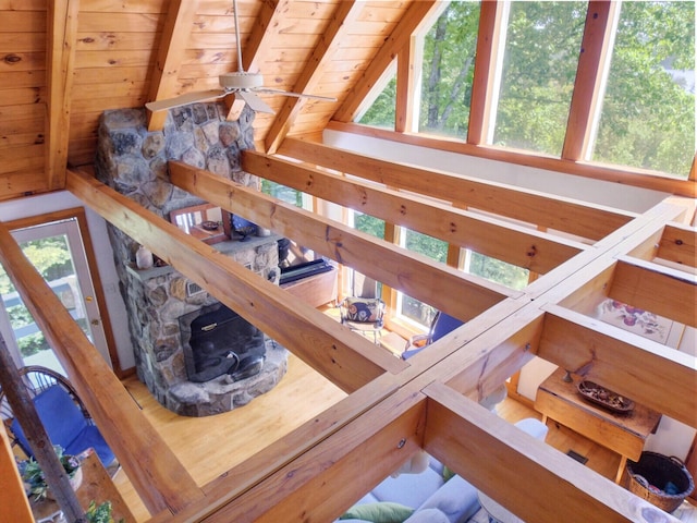 interior space with lofted ceiling with beams and wooden ceiling