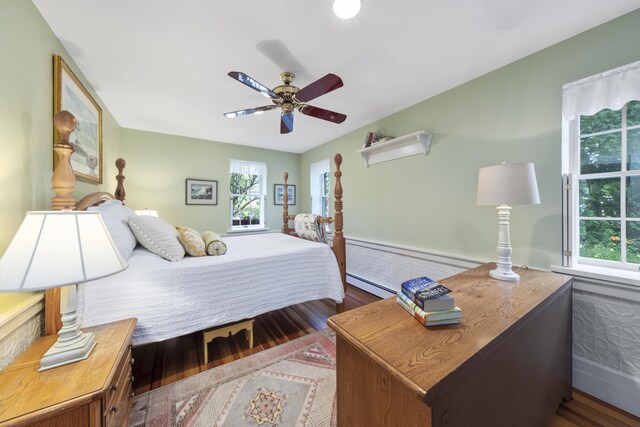 22 Porter Rd, Belfast, ME 04915 - bedroom featuring baseboard heating, wood finished floors, and ceiling fan