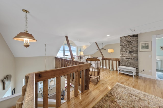 22 Porter Rd, Belfast, ME 04915 - hall with light wood finished floors, attic access, an upstairs landing, and lofted ceiling