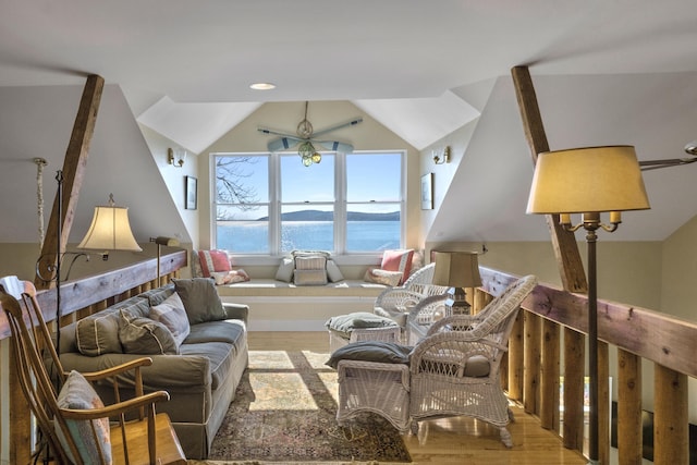 22 Porter Rd, Belfast, ME 04915 - living area featuring lofted ceiling, wood finished floors, and a water view