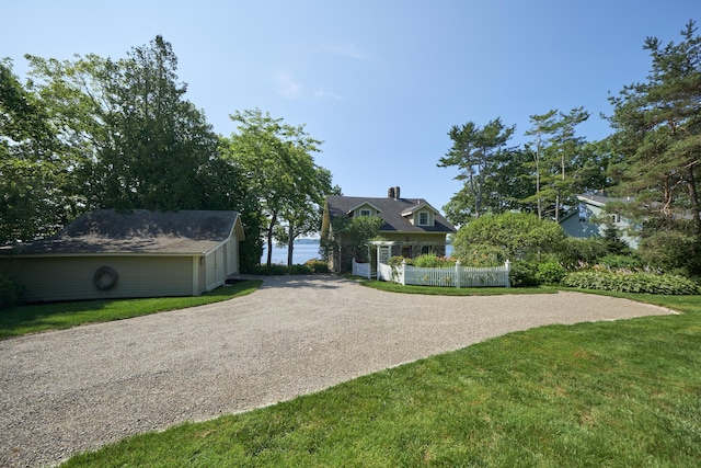22 Porter Rd, Belfast, ME 04915 - view of front facade with a front lawn, driveway, and fence