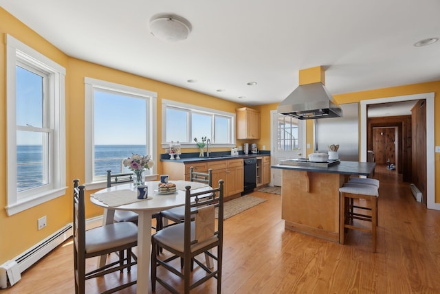 1 Moore Ln, Biddeford, ME 04005 - dining area with light wood-style floors, baseboard heating, and recessed lighting
