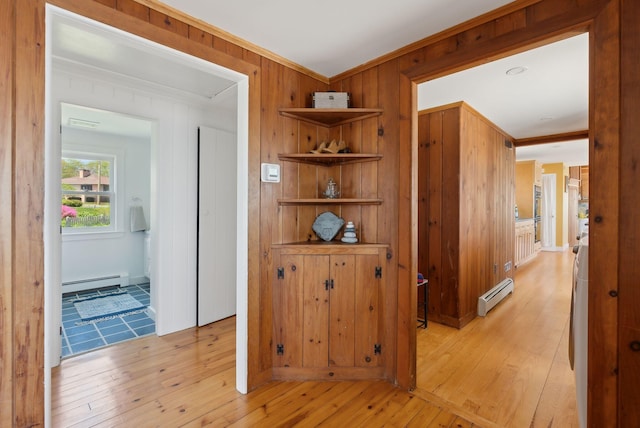 1 Moore Ln, Biddeford, ME 04005 - hall with a baseboard radiator, crown molding, light wood-style flooring, and wooden walls