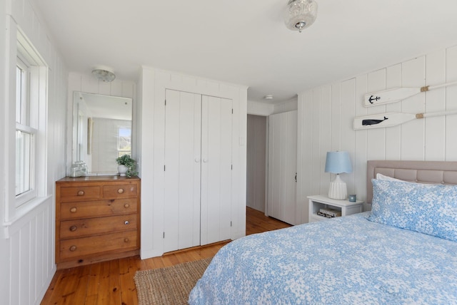 1 Moore Ln, Biddeford, ME 04005 - bedroom with wood finished floors, a closet, and multiple windows
