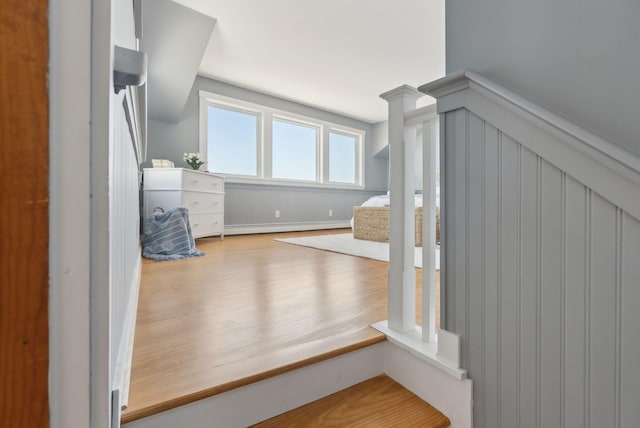 1 Moore Ln, Biddeford, ME 04005 - stairway featuring wood finished floors and a baseboard heating unit