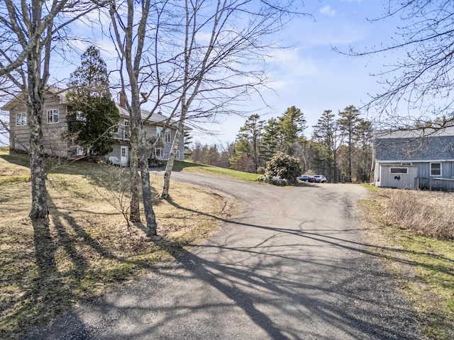 view of road with driveway