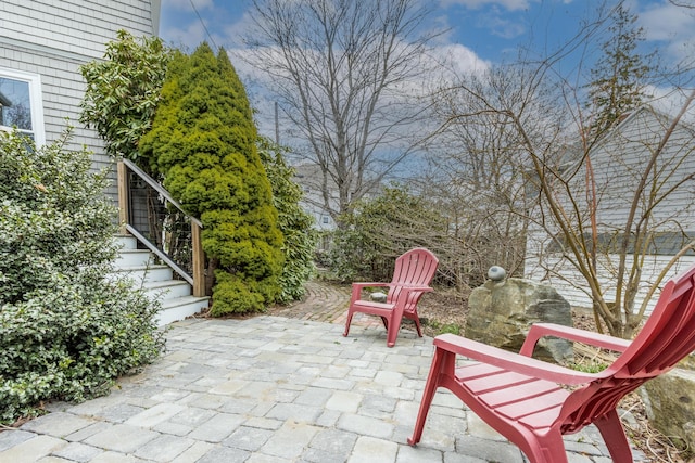 view of patio with stairway