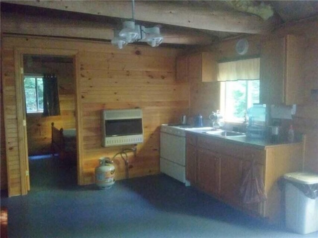 14 Mountain Stream Ln, Moscow, ME 04920 - kitchen featuring heating unit, beamed ceiling, and wooden walls