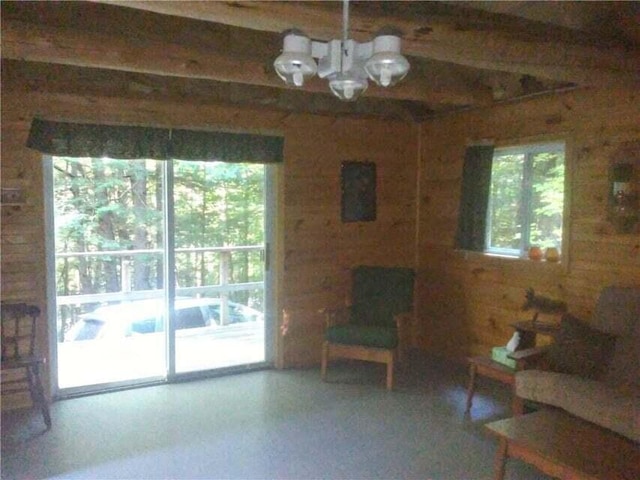 14 Mountain Stream Ln, Moscow, ME 04920 - living area featuring an inviting chandelier and beamed ceiling