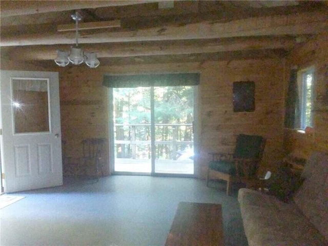 14 Mountain Stream Ln, Moscow, ME 04920 - living room with an inviting chandelier and beamed ceiling
