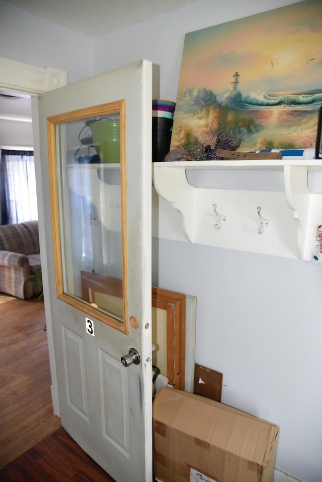 details featuring wood finished floors