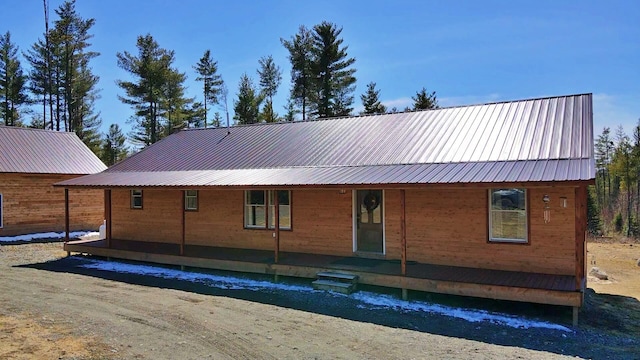 476 N Rd, Medford, ME 04463 - back of property with a porch and metal roof