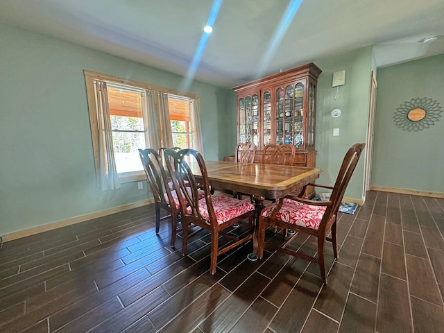 476 N Rd, Medford, ME 04463 - dining area with wood tiled floor and baseboards