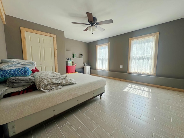 476 N Rd, Medford, ME 04463 - bedroom featuring a ceiling fan and baseboards
