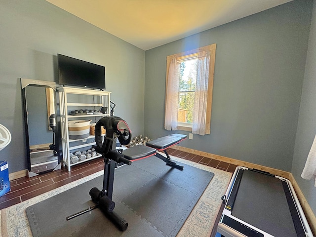 476 N Rd, Medford, ME 04463 - exercise room with baseboards and wood finished floors