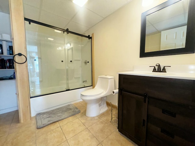 476 N Rd, Medford, ME 04463 - full bath featuring vanity, toilet, shower / bath combination with glass door, a paneled ceiling, and tile patterned floors