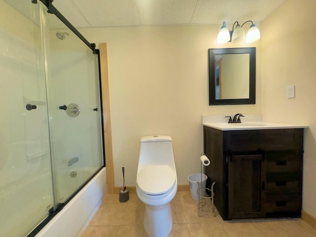 476 N Rd, Medford, ME 04463 - full bath with vanity, shower / bath combination with glass door, toilet, baseboards, and tile patterned floors
