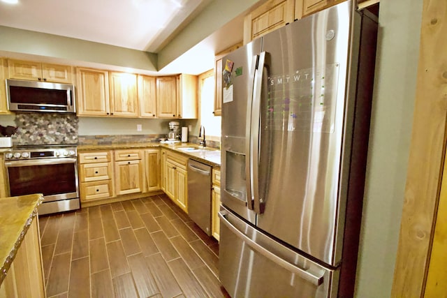 476 N Rd, Medford, ME 04463 - kitchen with light brown cabinetry, appliances with stainless steel finishes, backsplash, and a sink
