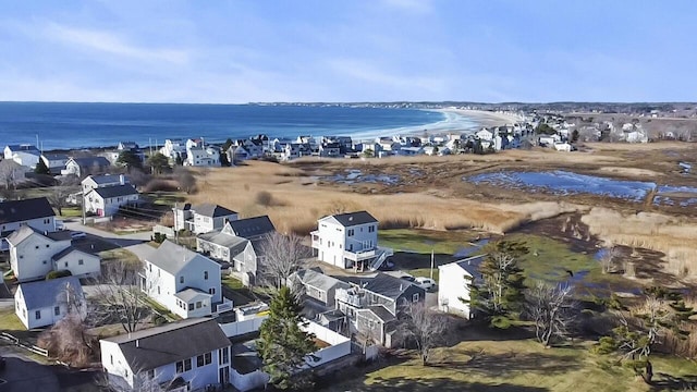 birds eye view of property featuring a residential view and a water view