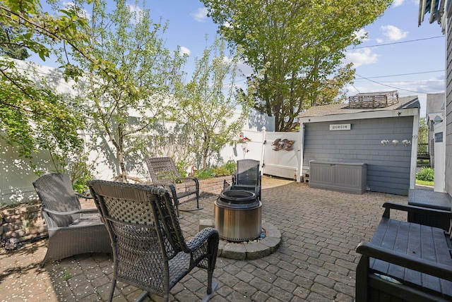 17 Clifford Ln, Wells, ME 04090 - view of patio / terrace featuring a fire pit and a fenced backyard
