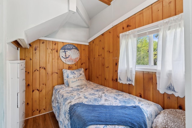 17 Clifford Ln, Wells, ME 04090 - bedroom featuring wood walls and wood finished floors