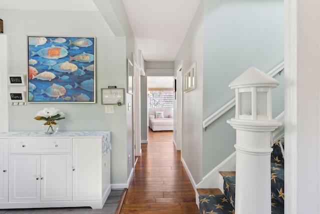 17 Clifford Ln, Wells, ME 04090 - hall featuring dark wood-type flooring, stairway, and baseboards