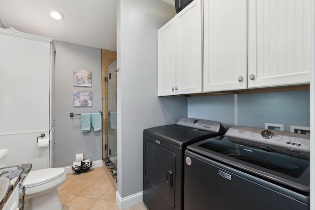 17 Clifford Ln, Wells, ME 04090 - laundry area with washer and clothes dryer, baseboards, light tile patterned flooring, and recessed lighting