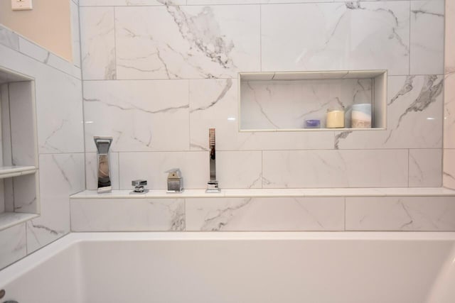 interior details featuring a tub