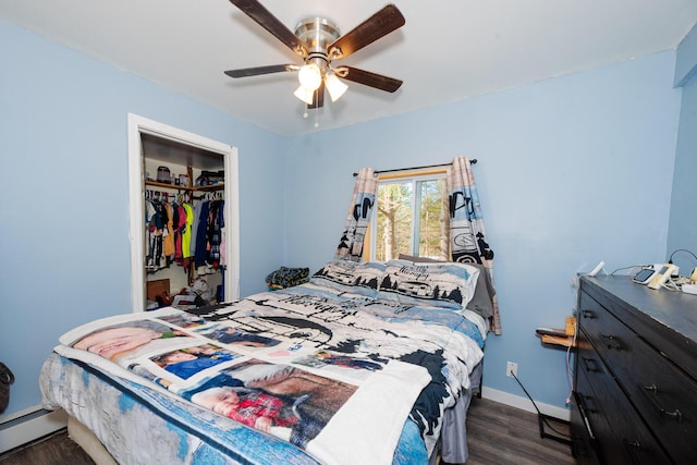 44 Sunset Ave, Wilton, ME 04294 - bedroom with ceiling fan, baseboard heating, a closet, baseboards, and dark wood-type flooring
