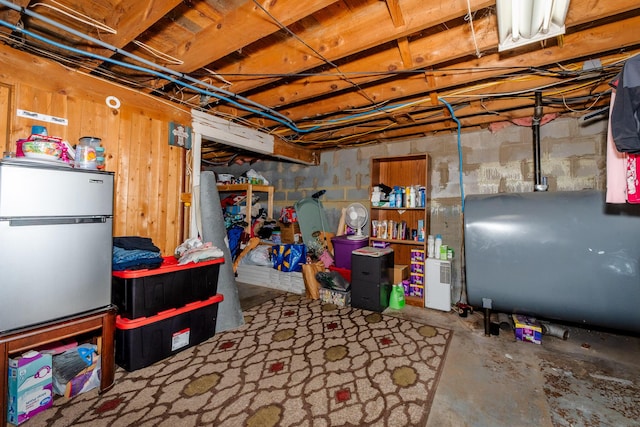 44 Sunset Ave, Wilton, ME 04294 - unfinished basement featuring heating fuel and freestanding refrigerator