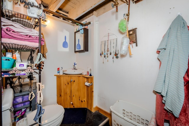 44 Sunset Ave, Wilton, ME 04294 - half bath featuring vanity and toilet
