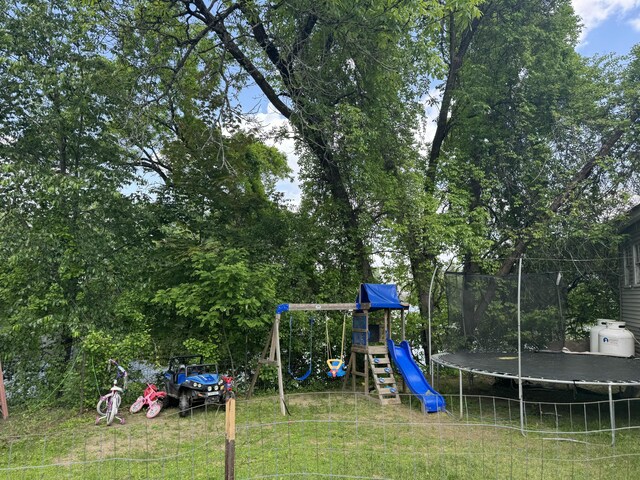29 W Front St, Skowhegan, ME 04976 - view of play area featuring a trampoline and a yard