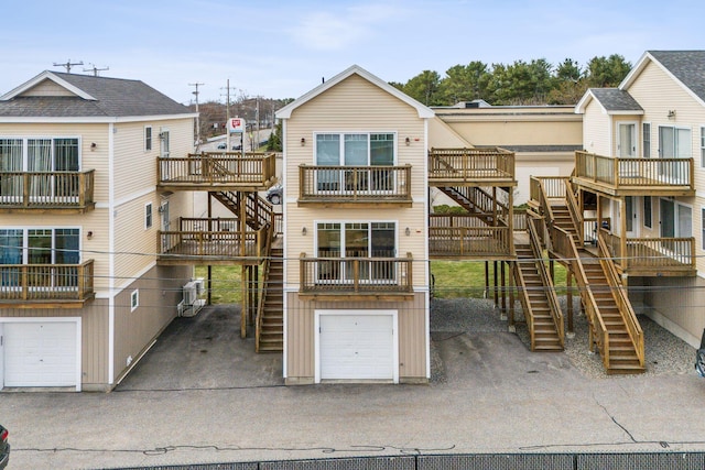 35 Barefoot Cottage Rd Unit 163, Wells, ME 04090 - view of front facade with an attached garage and stairs