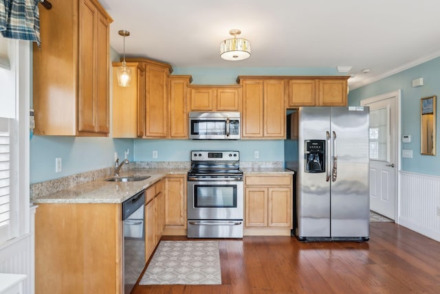 35 Barefoot Cottage Rd Unit 163, Wells, ME 04090 - kitchen with a sink, hanging light fixtures, appliances with stainless steel finishes, light stone countertops, and dark wood-type flooring