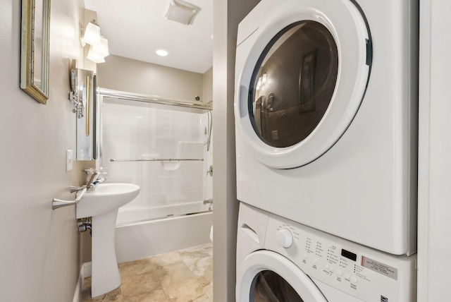 35 Barefoot Cottage Rd Unit 163, Wells, ME 04090 - laundry room with stacked washer / dryer and a sink