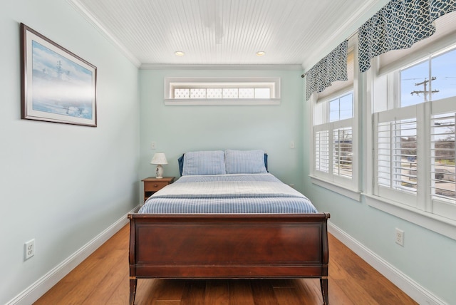 35 Barefoot Cottage Rd Unit 163, Wells, ME 04090 - bedroom with baseboards, crown molding, and wood finished floors