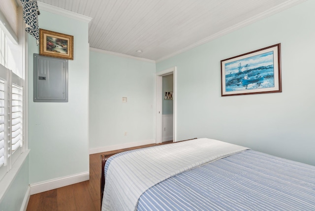 35 Barefoot Cottage Rd Unit 163, Wells, ME 04090 - bedroom with crown molding, wood finished floors, electric panel, wood ceiling, and baseboards